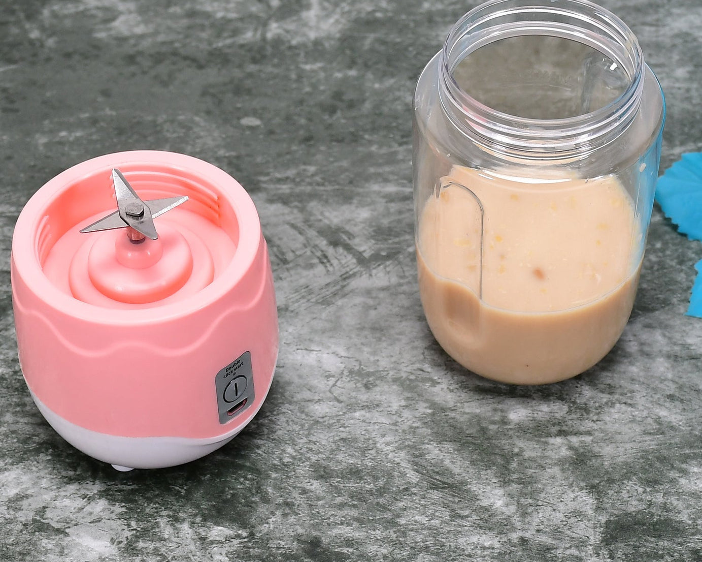 Handheld blender for quick fruit shakes.