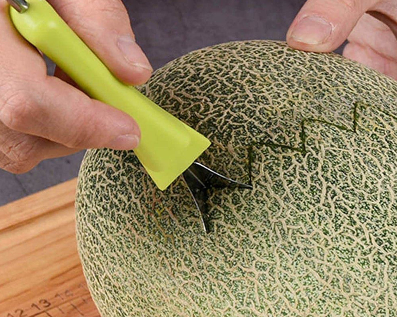 Double-sided fruit scooper
