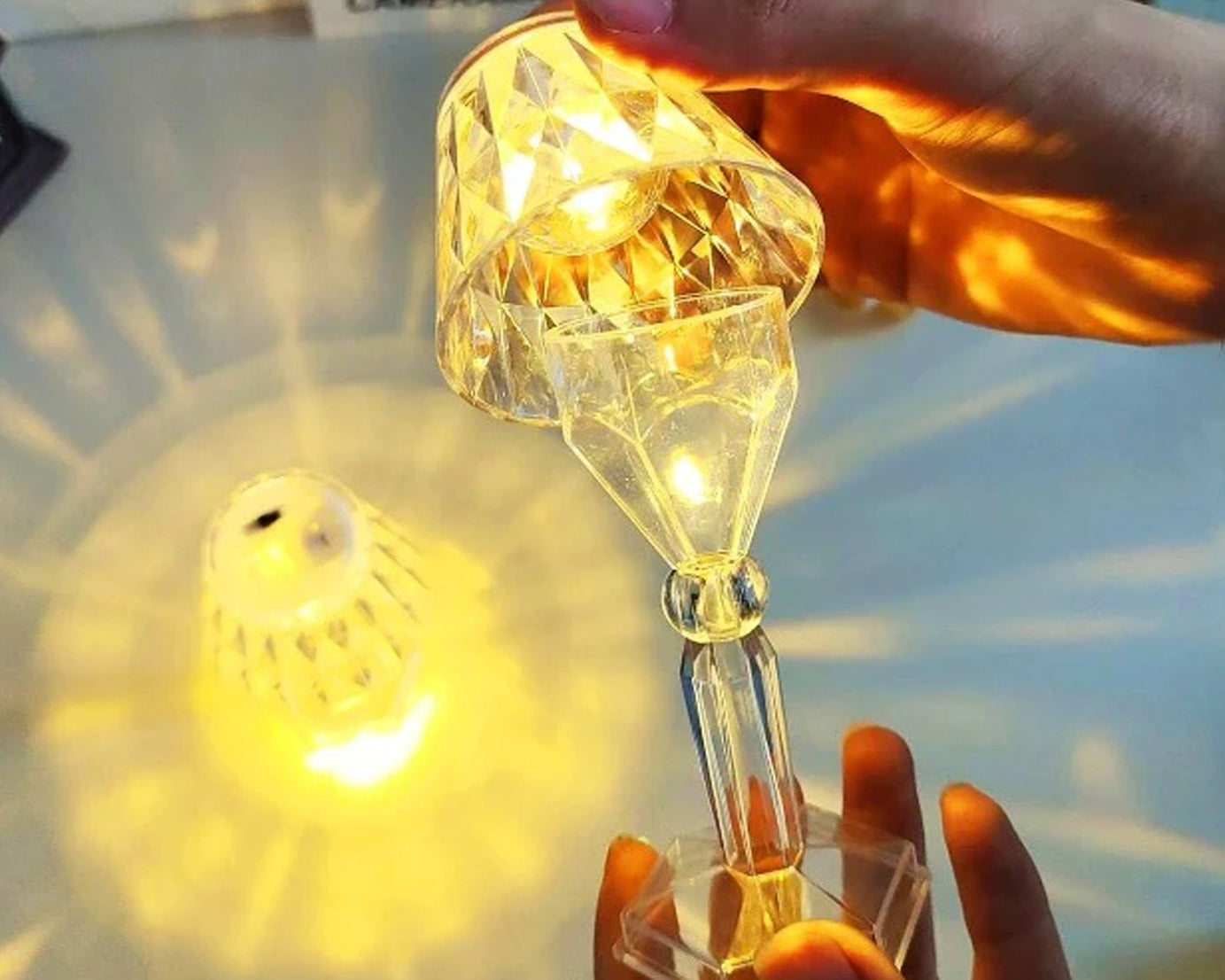 2-in-1 crystal table lamp with light reflection.