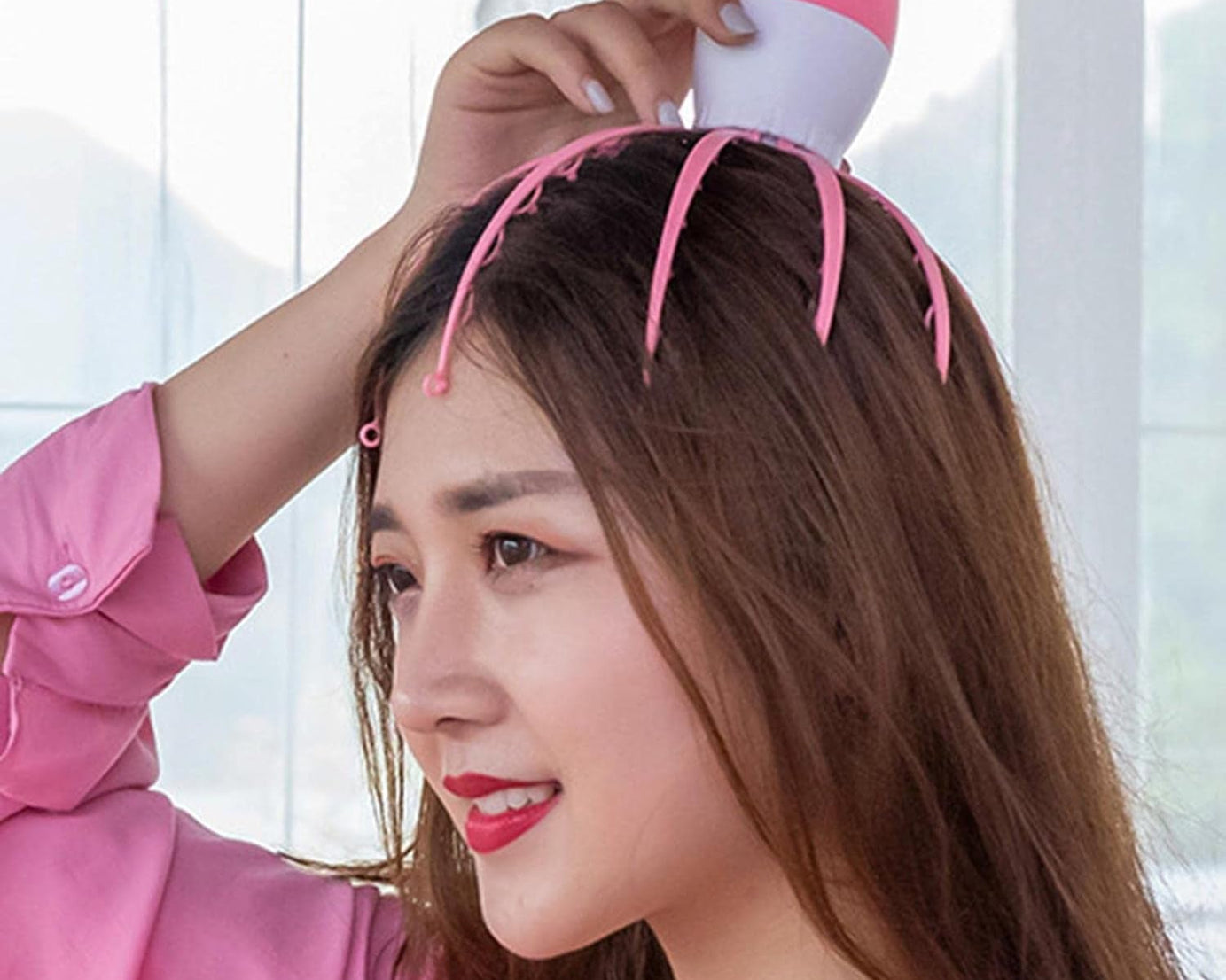 Scalp massager with electric octopus claws.