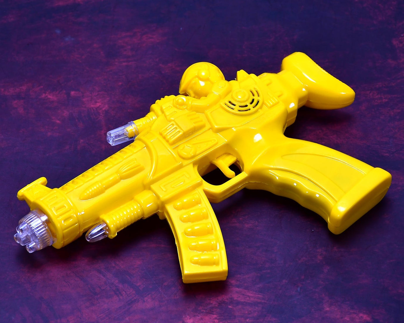 Transparent glow gear gun with rainbow lights