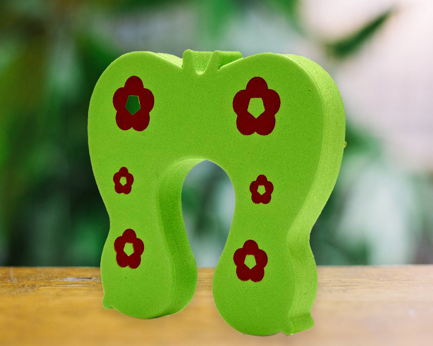 Soft foam door guard for kids, cute animal-shaped, keeps doors secure