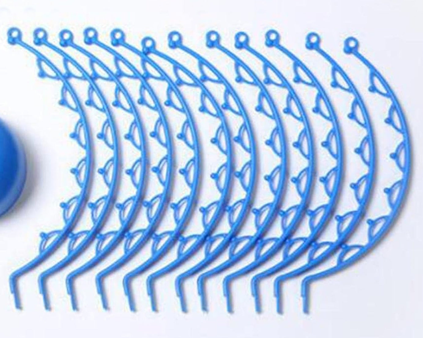 Scalp massager in octopus claw style.