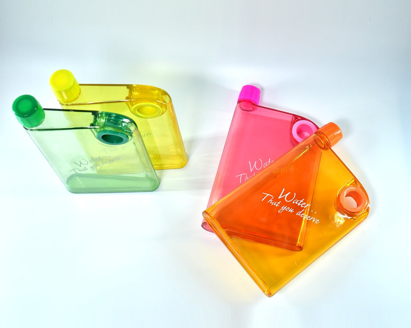 Slim, multicolor water bottle with a notebook look.