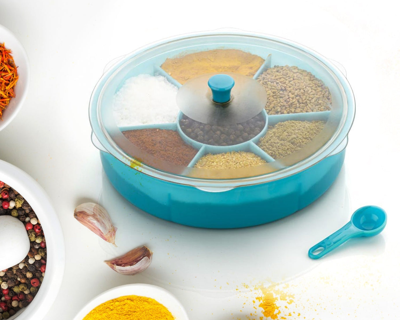 Multi-compartment dry-fruit and spice box with spoon