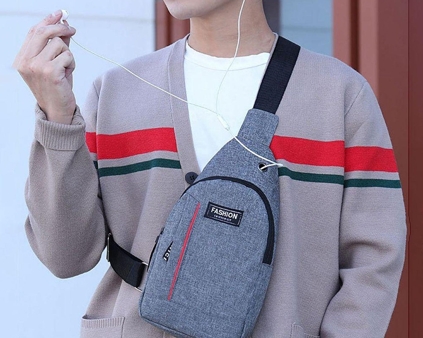 Grey crossbody fanny pack with earphone hook