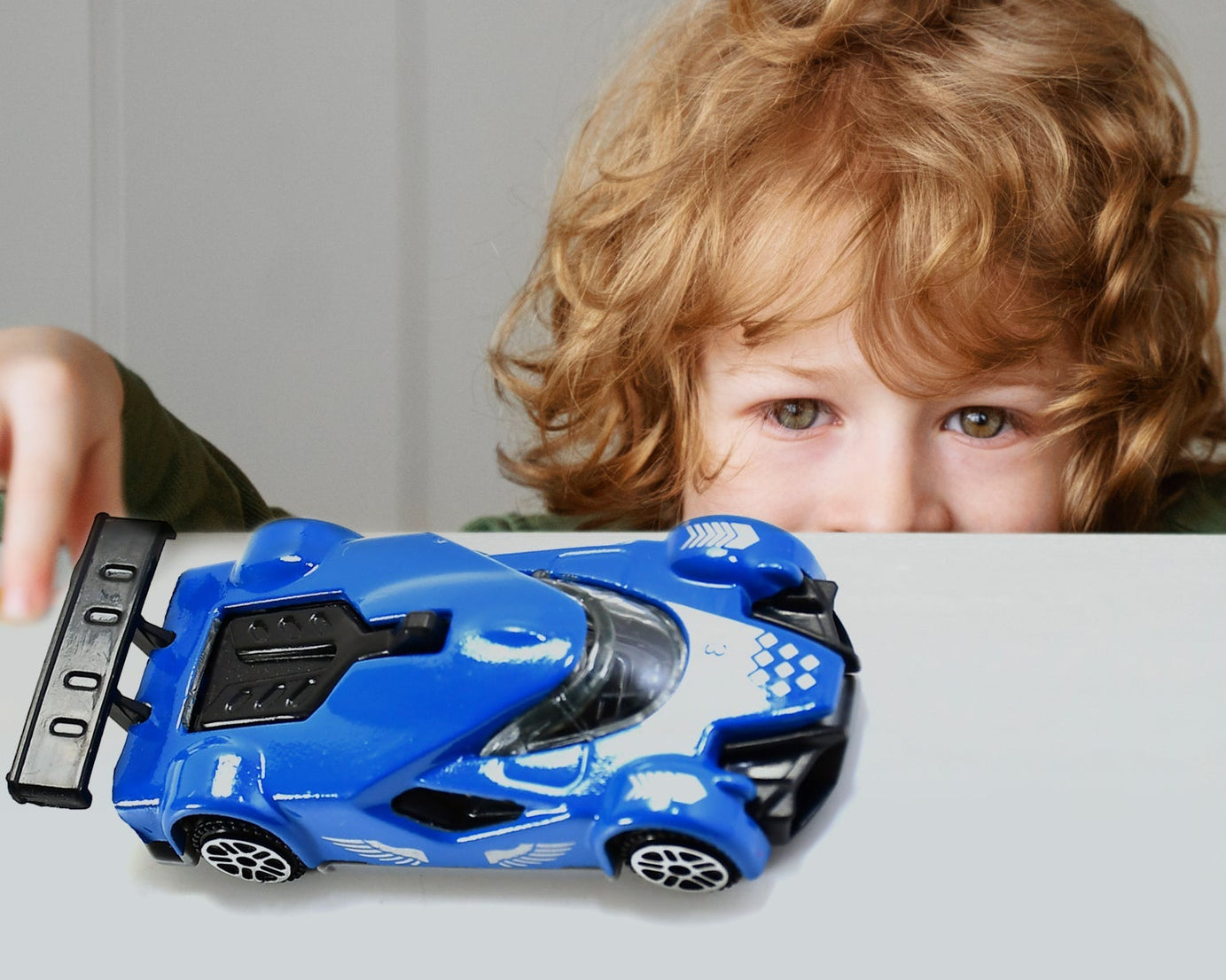 Die-cast metal race car toy, rear view