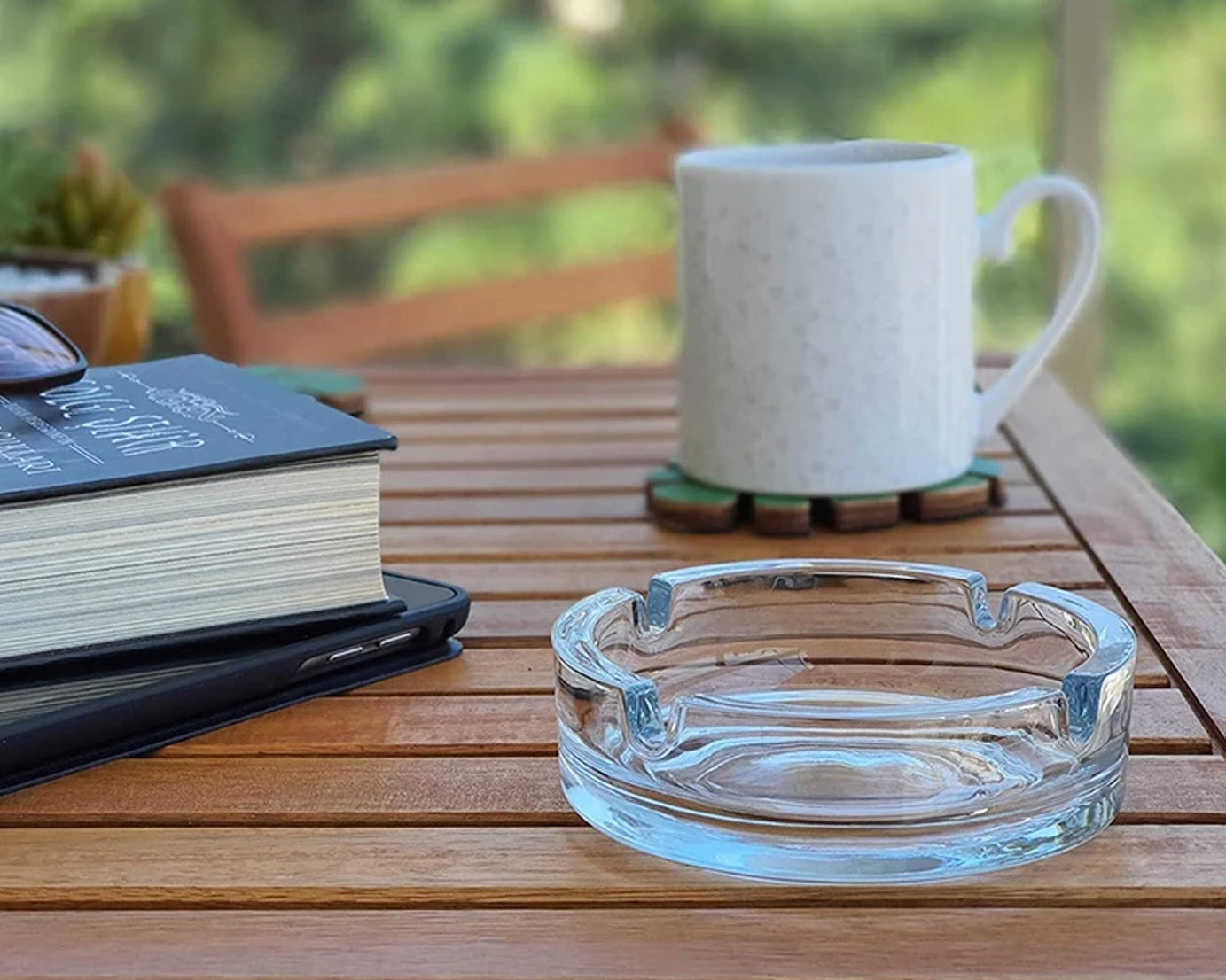 Elegant crystal ashtray with a smooth finish.