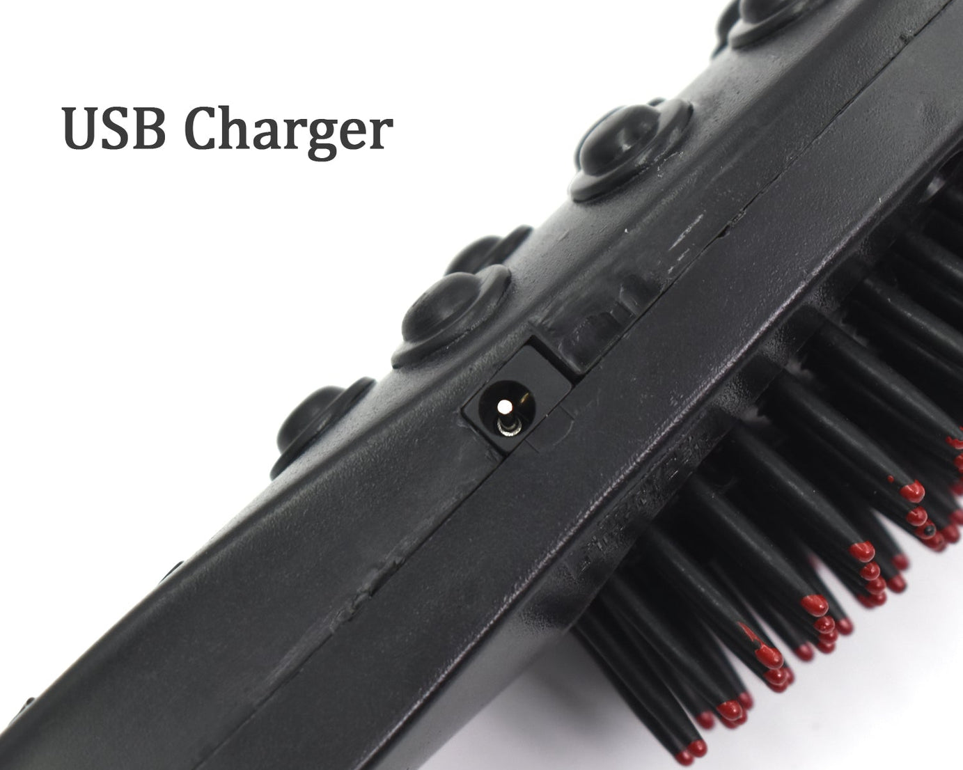 Vibrating electric comb massager for hair and scalp.