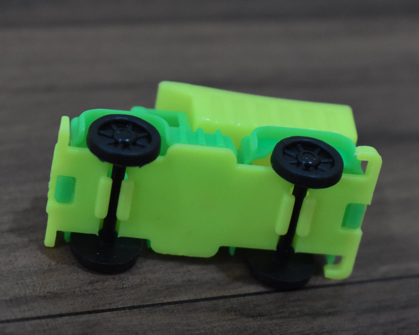 Toy truck with dump feature