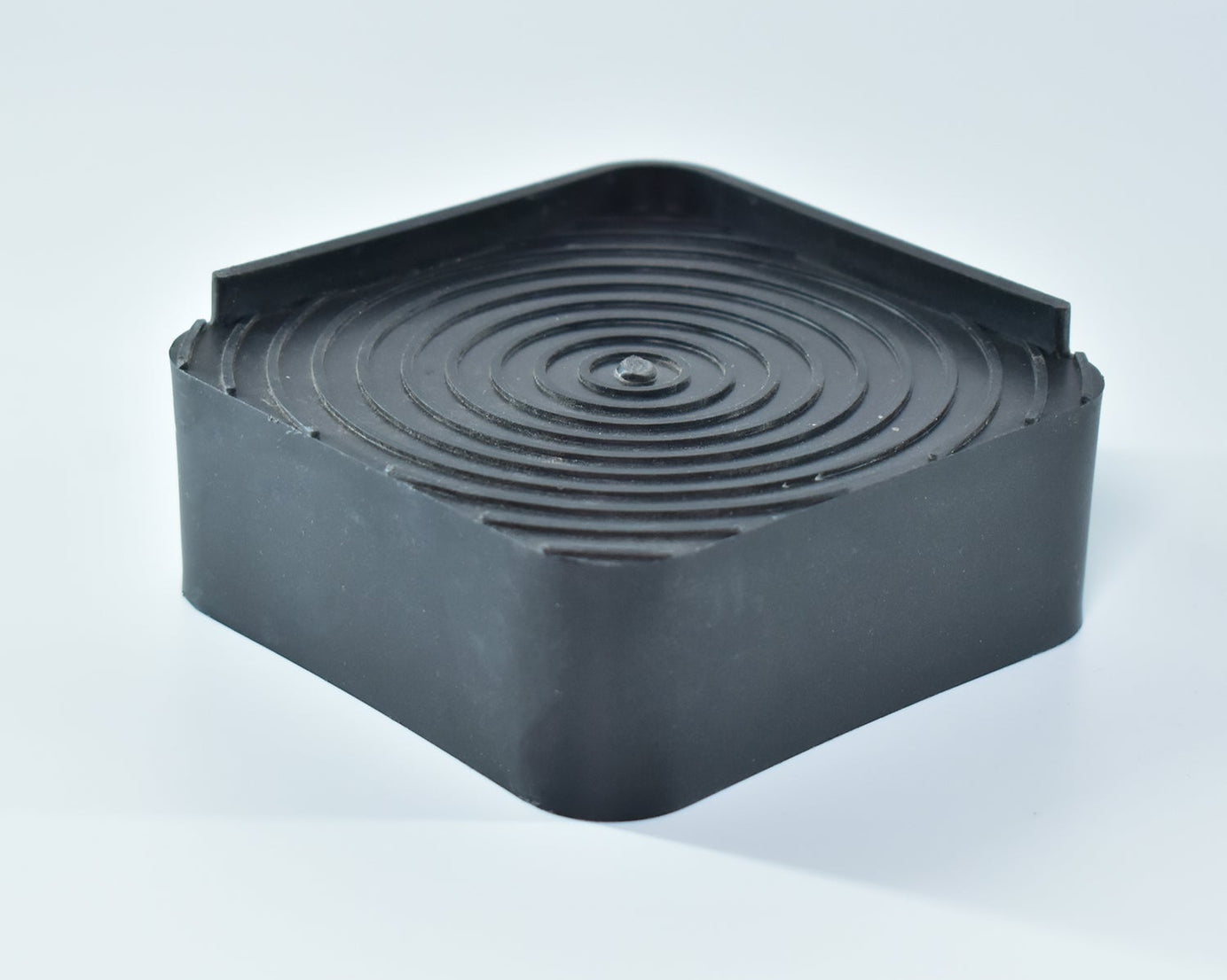 Set of four square base stands, ideal for enhancing furniture stability.