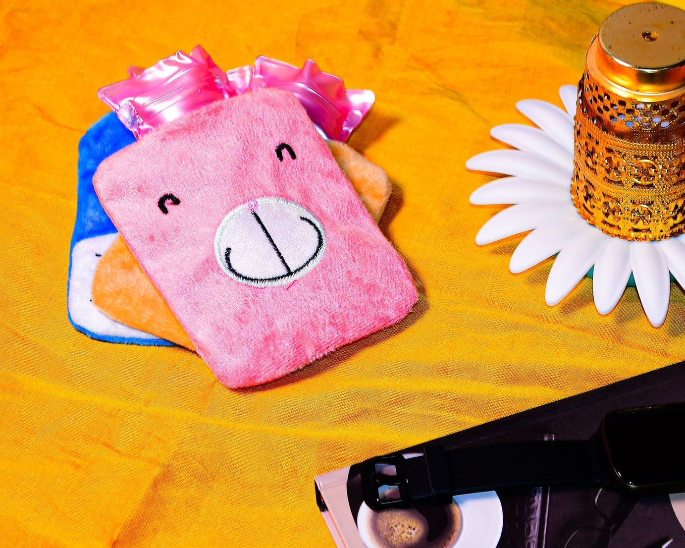 Small pink hot water bag for hand and feet warmth