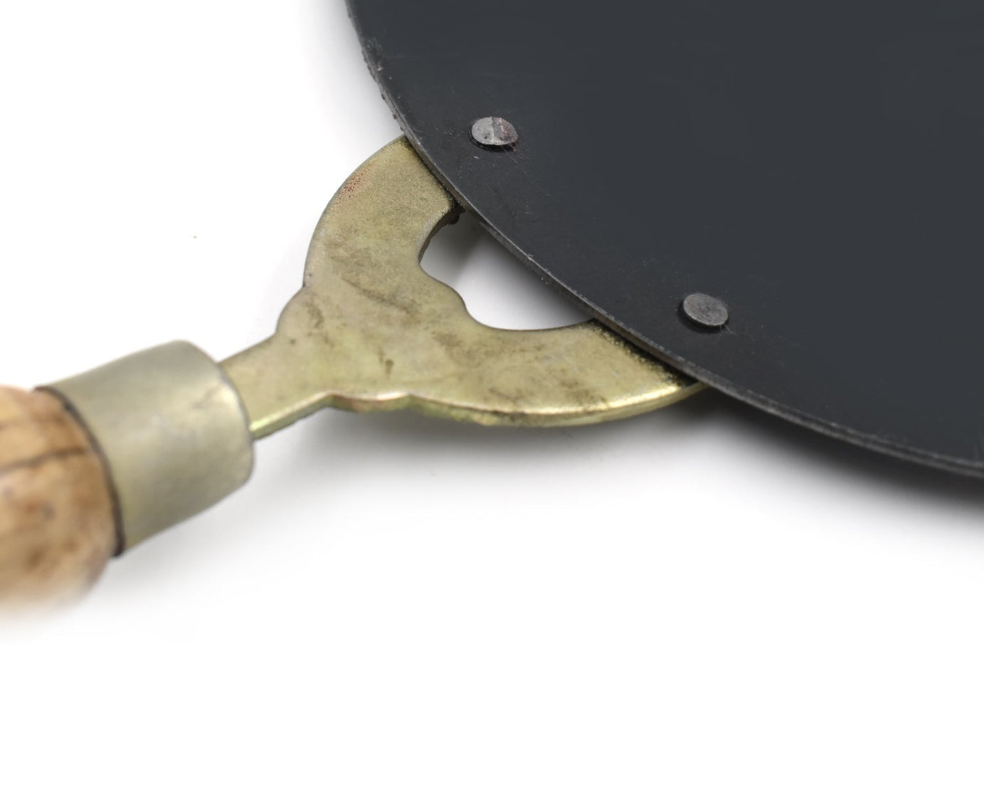 Long-lasting wooden handle tawa, great for preparing rotis and parathas.