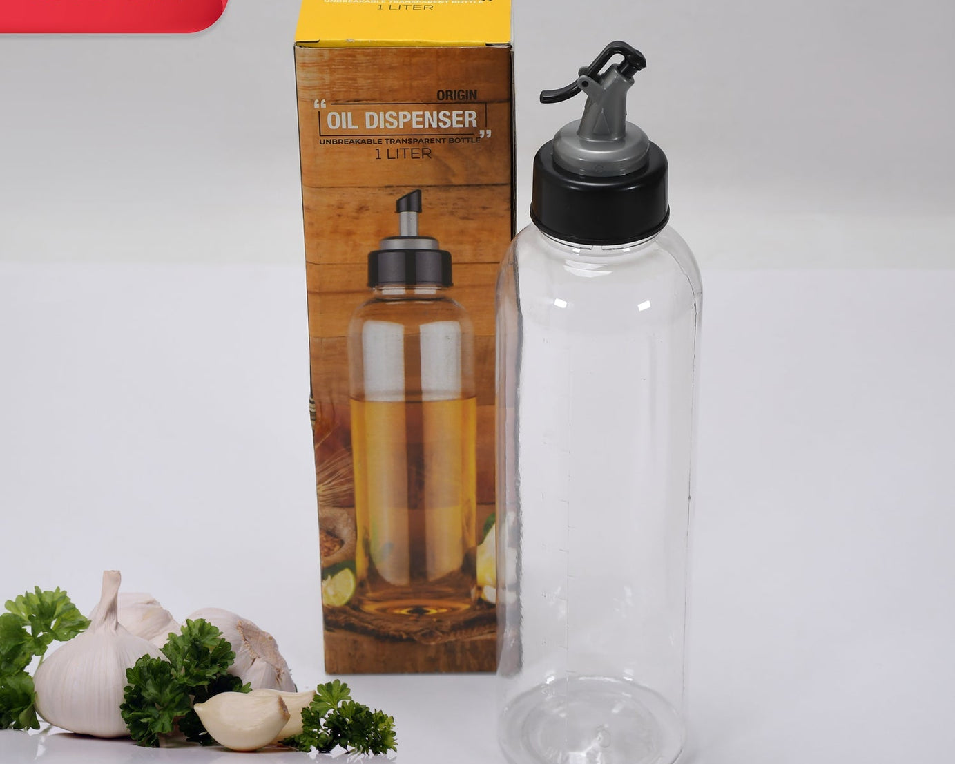 Clear plastic oil bottle, 1 liter, for easy dispensing.