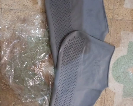 Close-up of anti-slip waterproof shoe covers