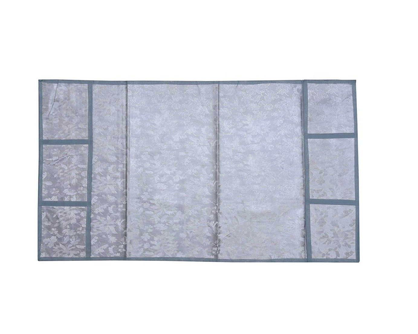 Multi-design decorative cover for refrigerator top.