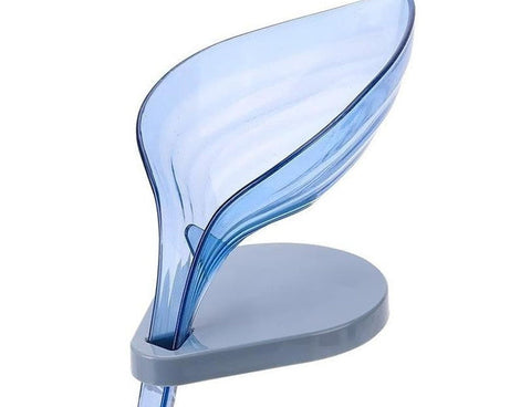 Self-draining leaf-shaped soap holder.