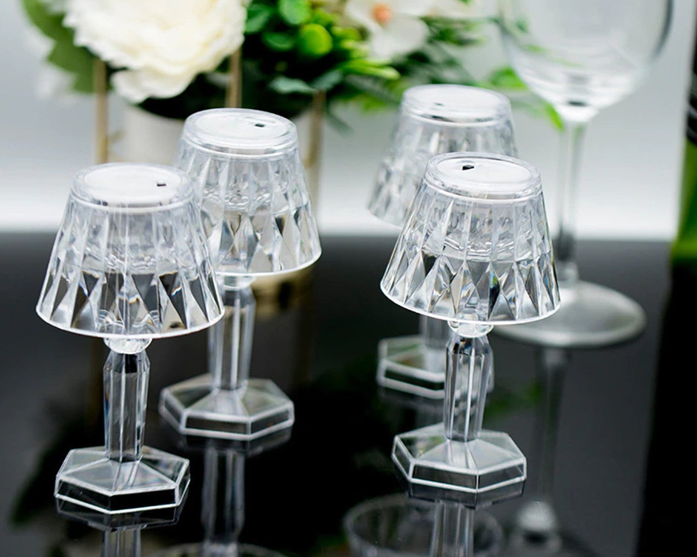 Mini crystal lamp with reflective light feature.