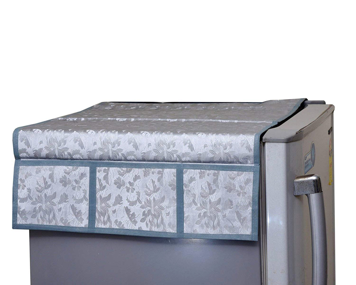 Fridge top cover featuring a mix of decorative patterns.