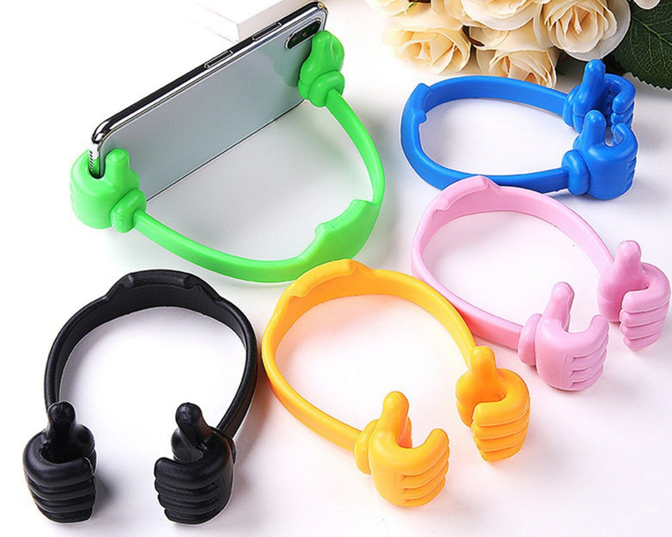Hand-shaped mobile stand for easy phone support at home and office.