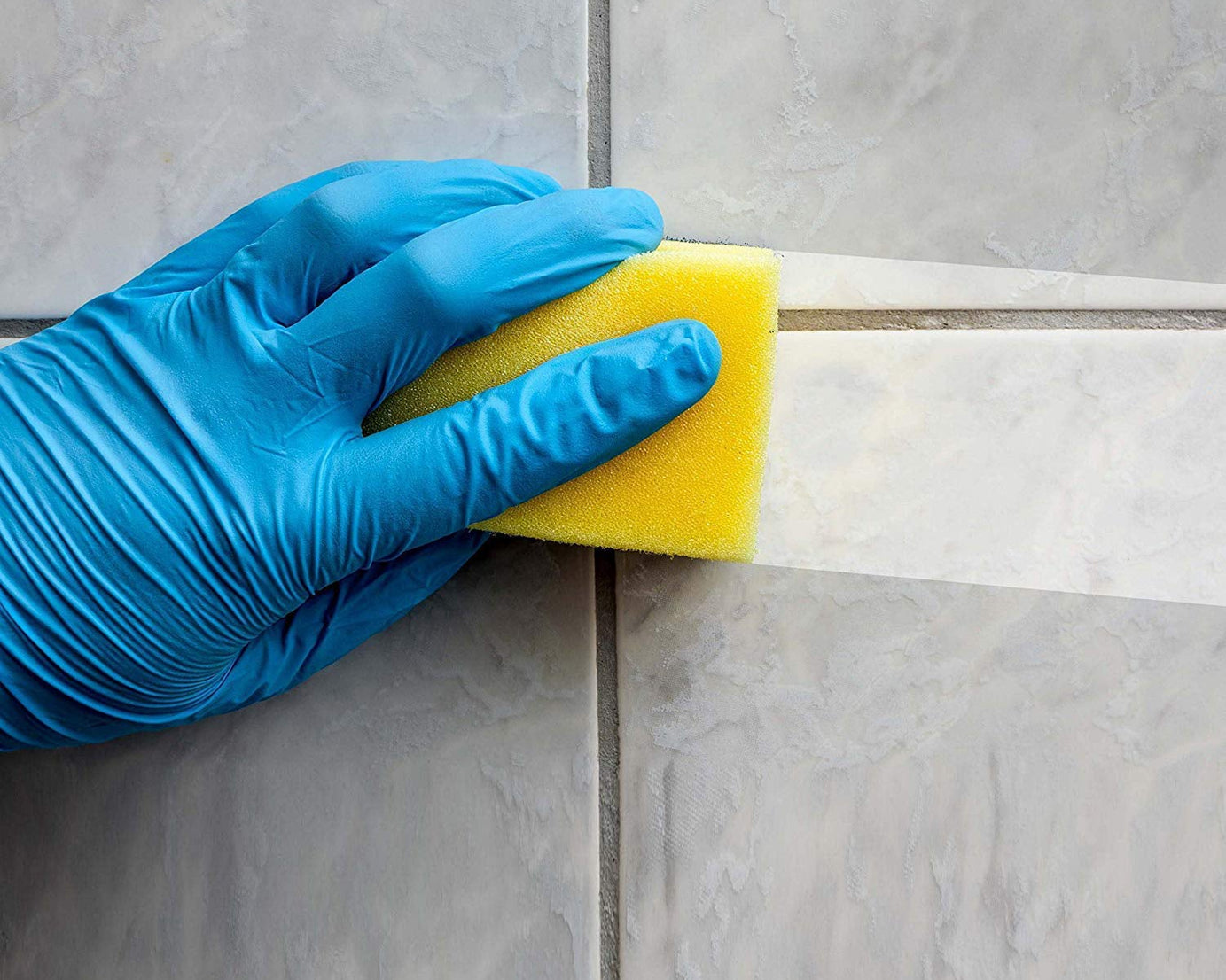 Durable scrub sponge, 2-in-1 design, perfect for cleaning kitchen and bathroom surfaces.