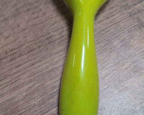 Sturdy stainless steel peeler for peeling fruits and vegetables, ideal for everyday kitchen use.