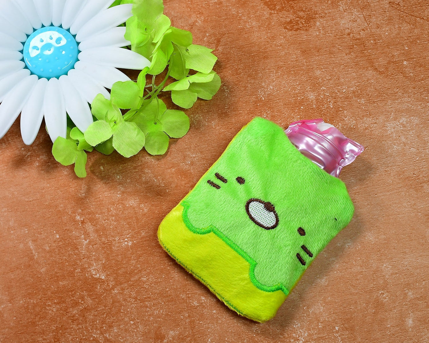 Hot water bag with green Kitty design for neck, shoulder pain, and cramps