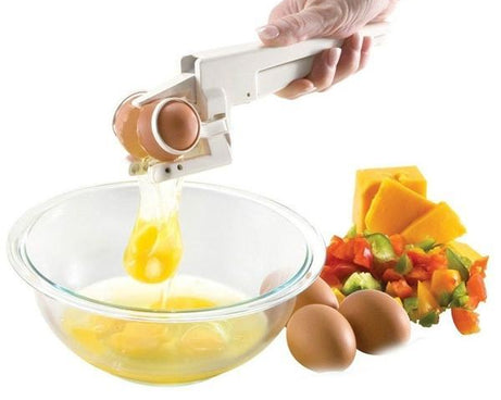 Handheld egg separator and cracker.
