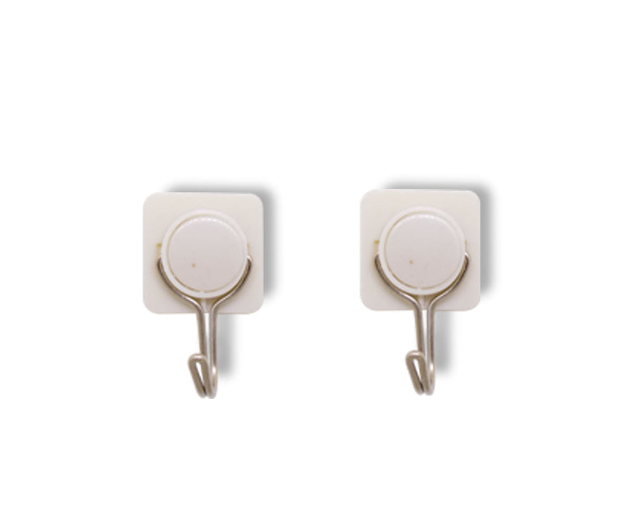 Small stainless steel adhesive wall hook for versatile use.