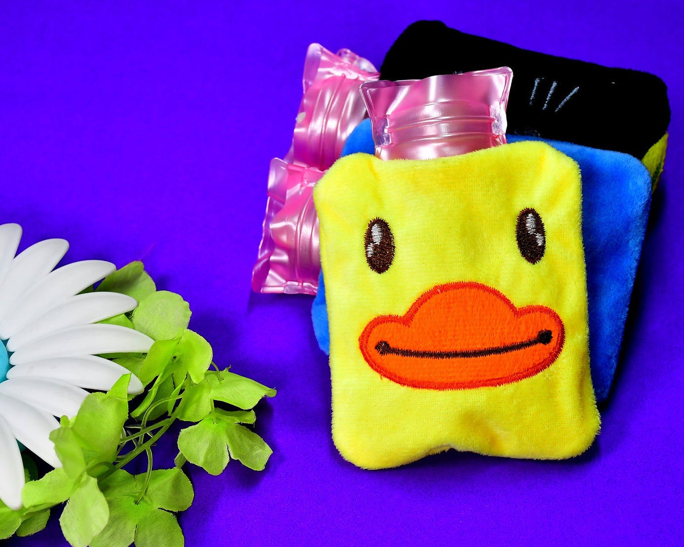 Hot water bag in yellow duck shape for neck, shoulder pain, and menstrual cramps