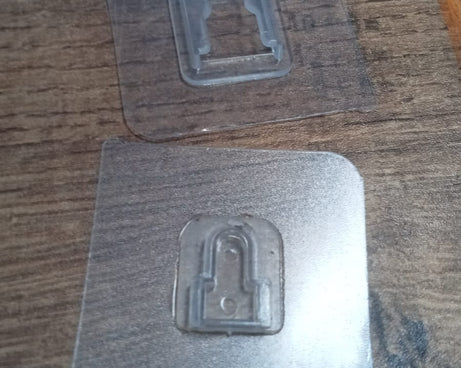 Magic adhesive hooks, heavy duty, pack of 20, for versatile wall hanging.