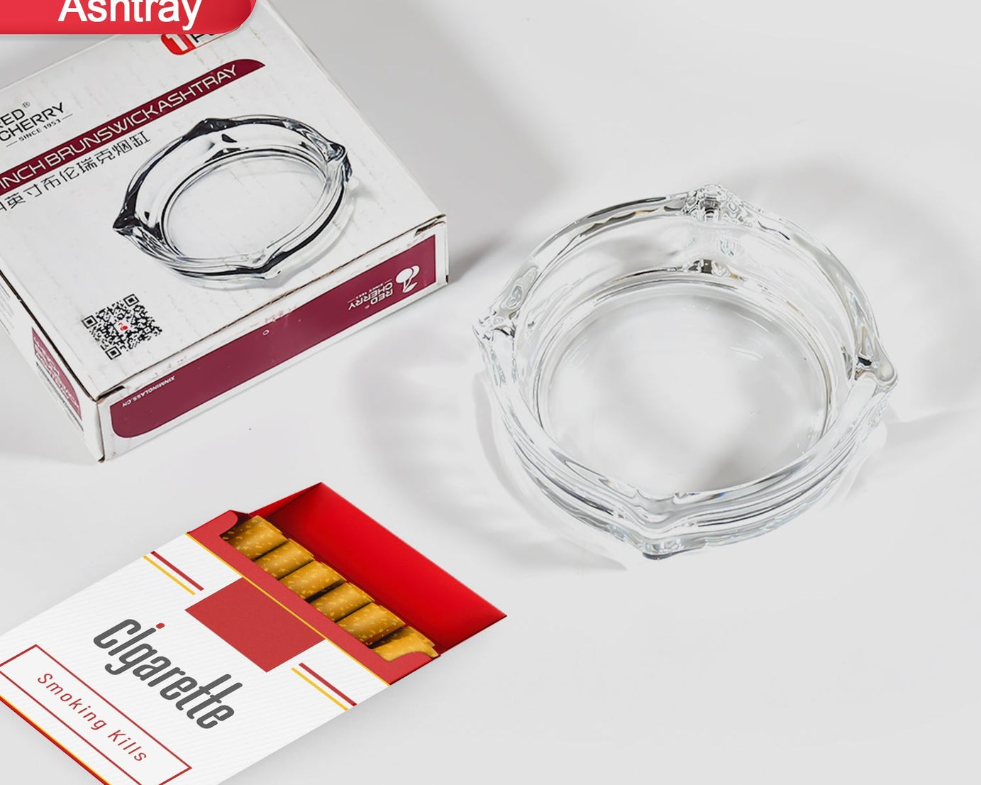 Round glass ashtray for home or office use.