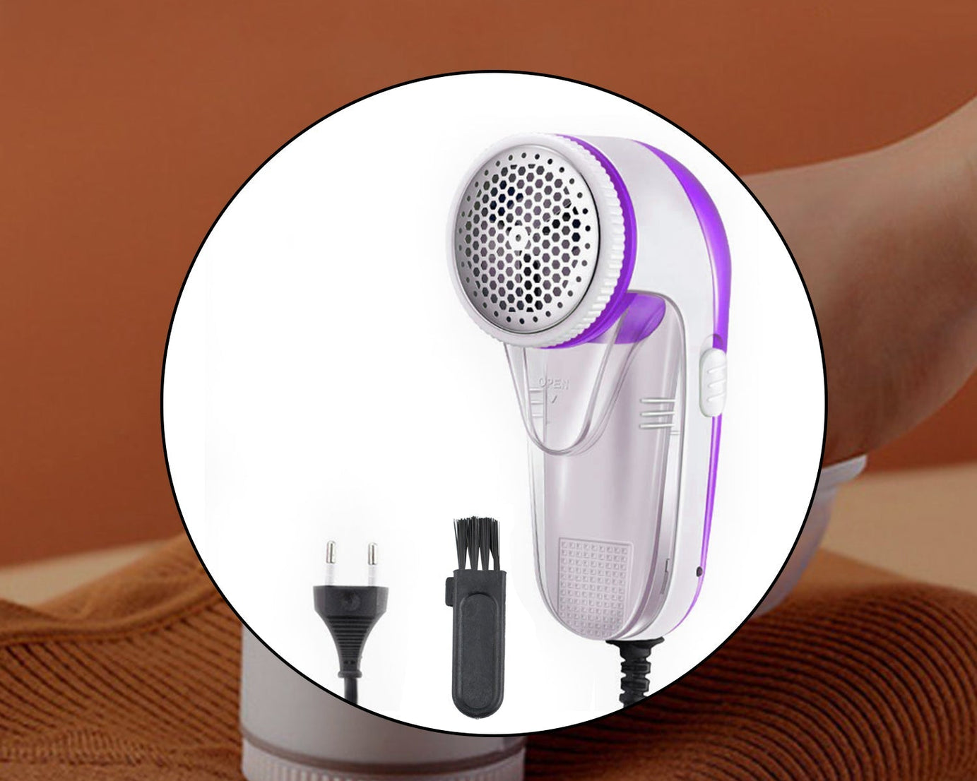 the lint remover, emphasizing its blade and ergonomic handle