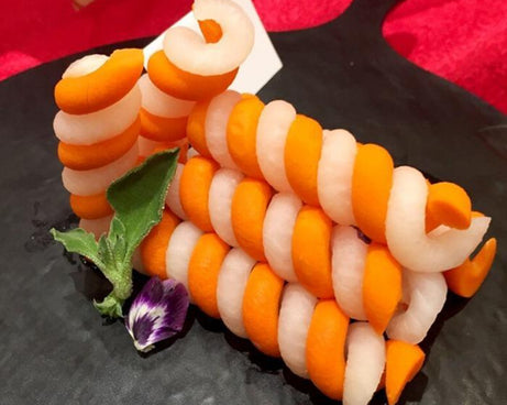 Spiral screw slicer for easy vegetable spiral cutting, perfect for salads and garnishes.