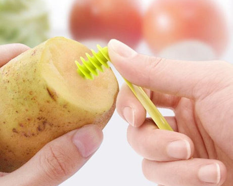 Kitchen spiral knife for slicing vegetables into stylish curly shapes for salads.