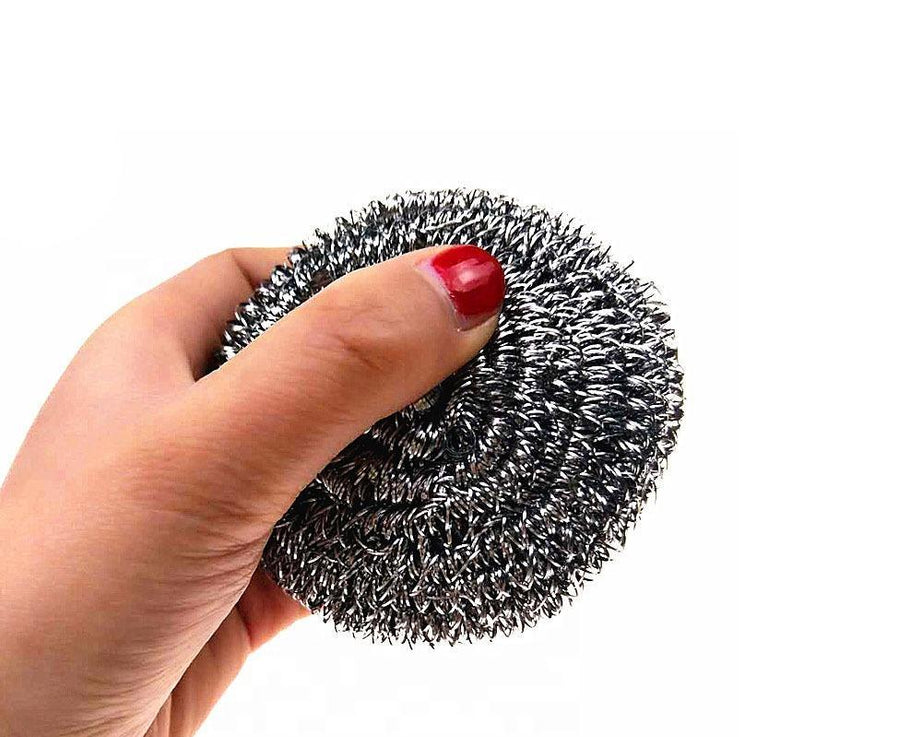 Single-piece stainless steel scrubber, perfect for heavy-duty cleaning tasks in the kitchen.