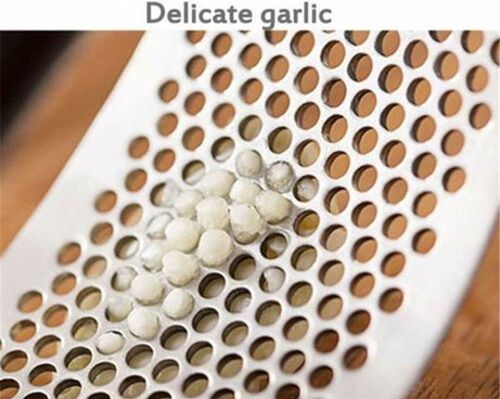 High-quality garlic presser with stainless steel build.