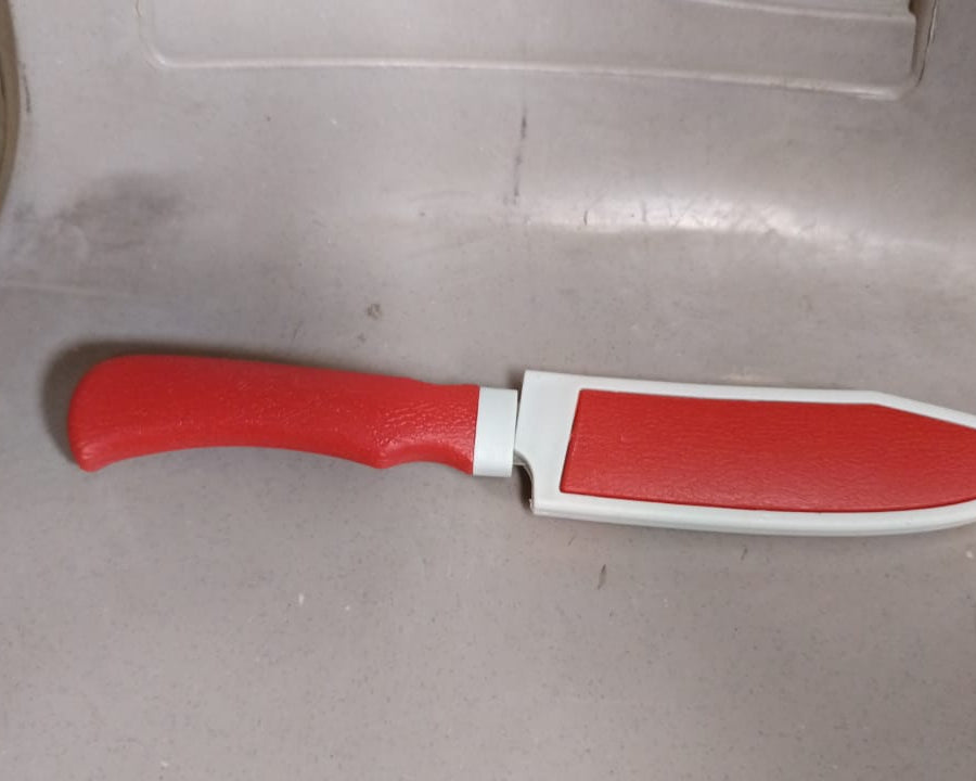 small knife with blade guard.