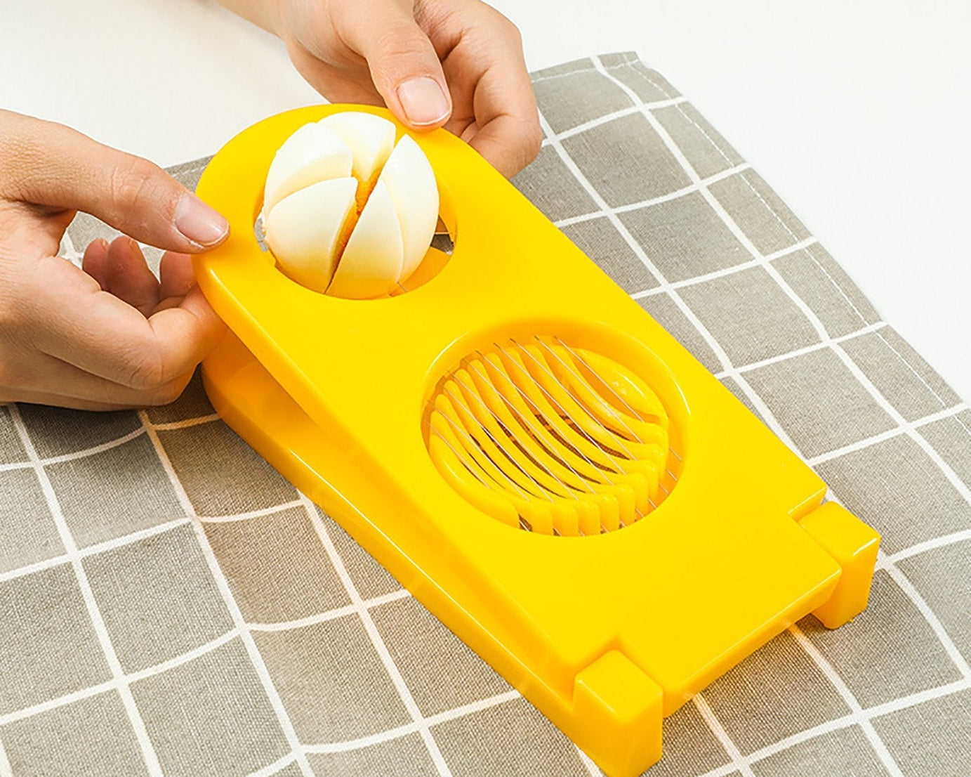 Detailed view of 2-in-1 egg cutter and slicer tool