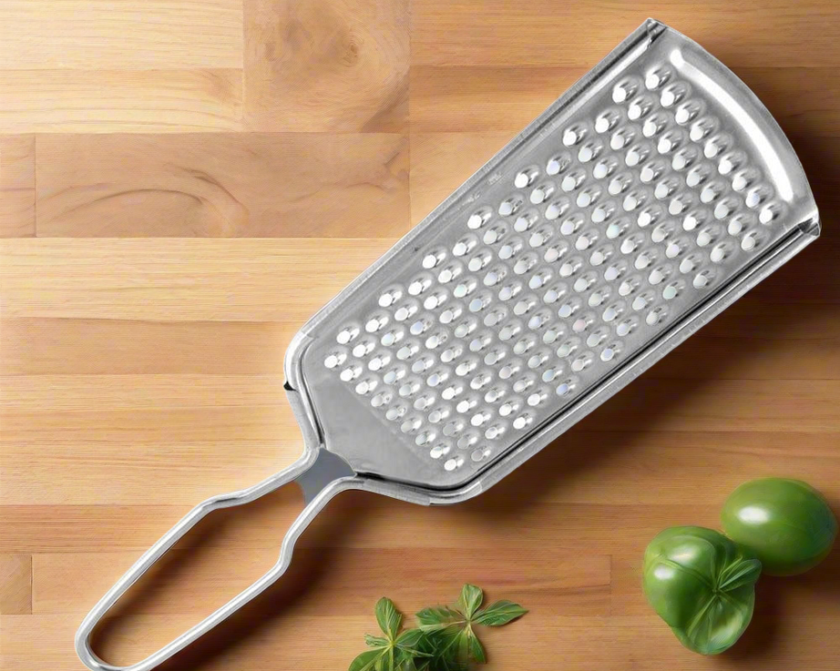 Efficient kitchen zester grater with a stainless steel build for easy citrus zesting and fine grating.