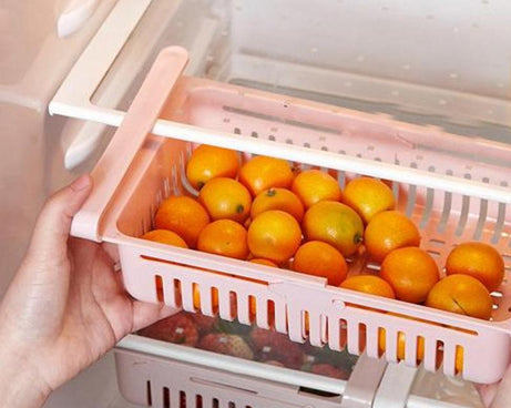 Multi-purpose fridge storage baskets for organized food.