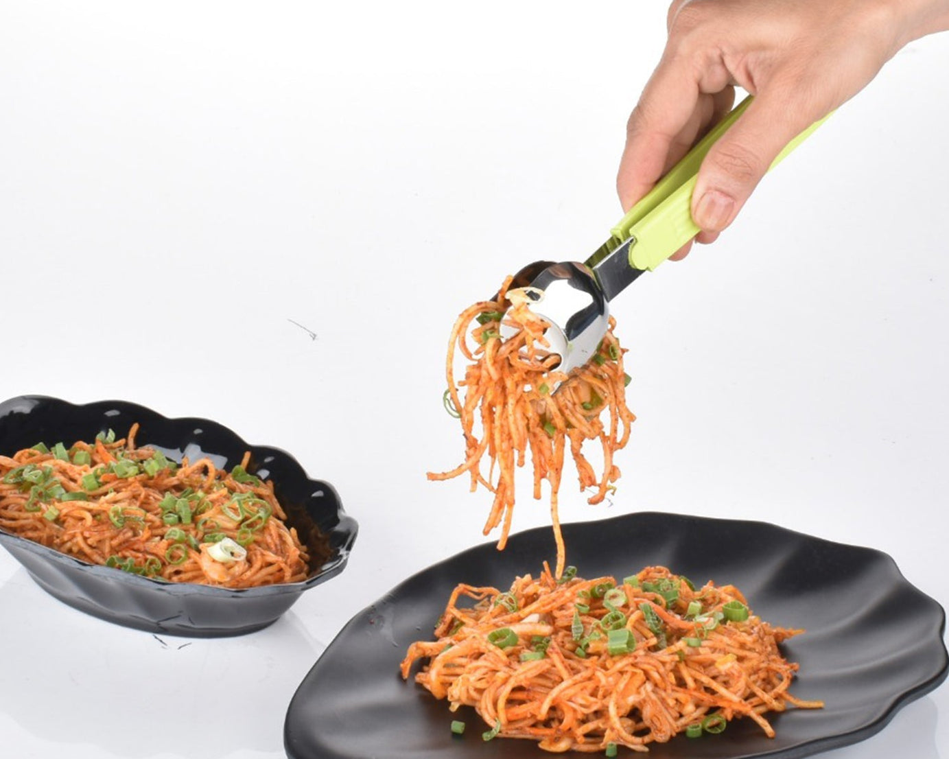 Durable multi-purpose tongs for serving salads and other foods at home.