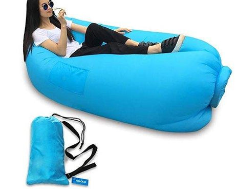 Inflatable camping lounger sofa in outdoor setting