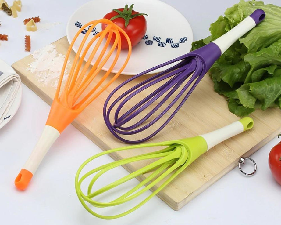 Efficient balloon whisk made from plastic for milk, coffee, eggs, and juices.