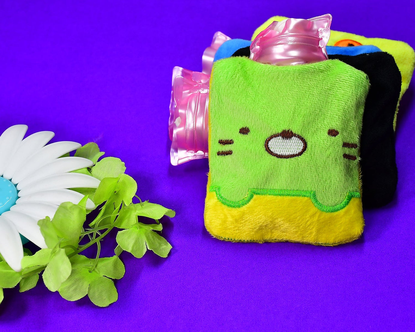 Small green Kitty hot water bag with cover for hand, feet warming