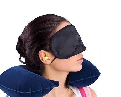 Travel essentials kit with pillow and eye mask.