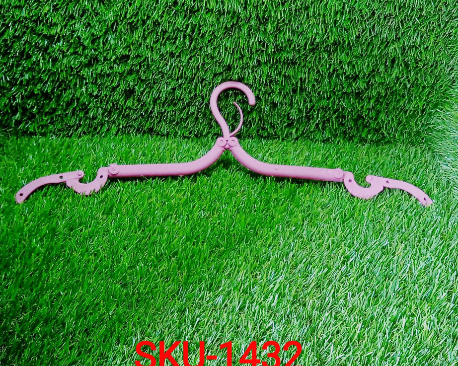 Multicolor plastic hanger, foldable, lightweight, ideal for traveling and organizing closets.