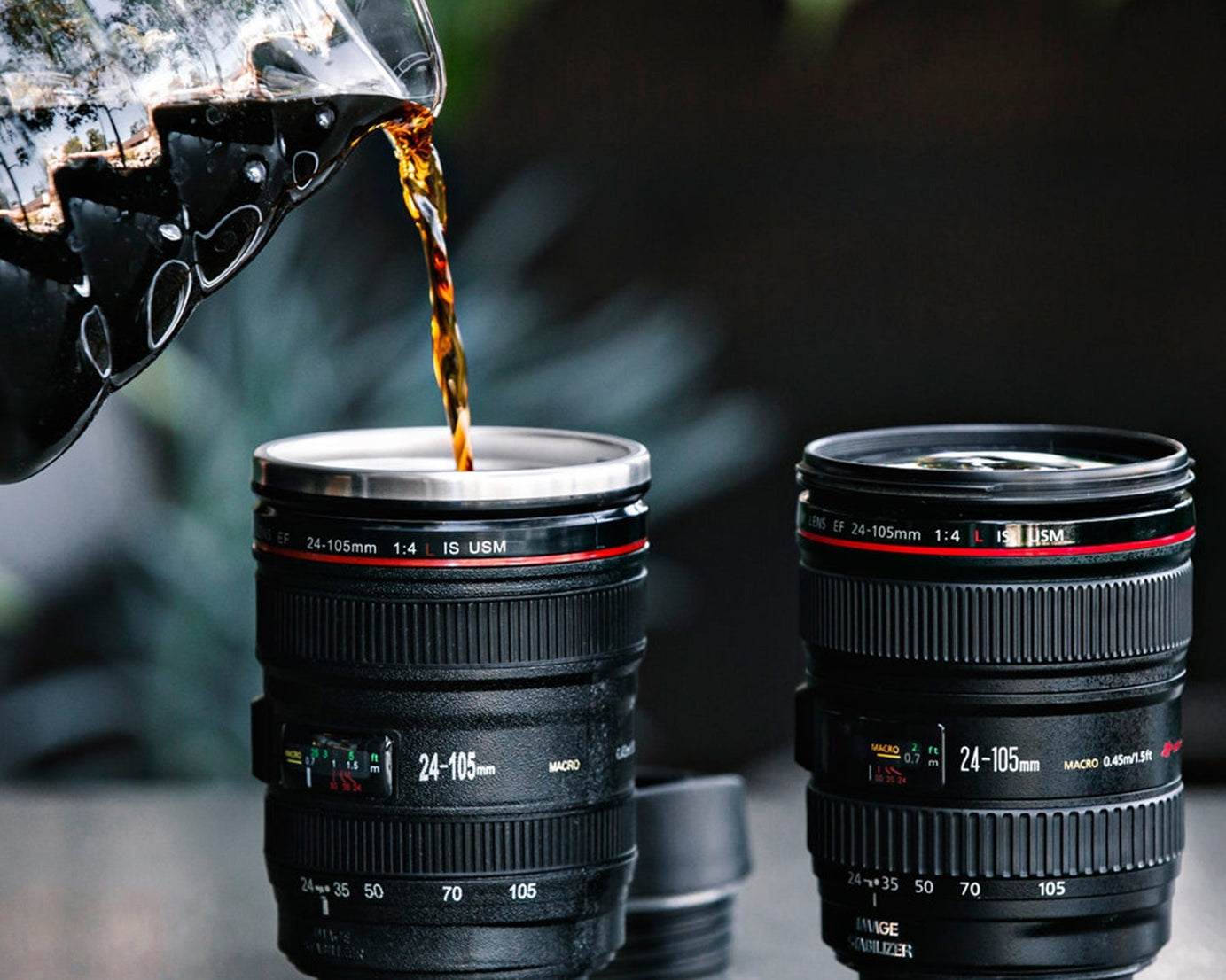 Coffee mug designed like a camera lens, made of stainless steel with intricate detailing