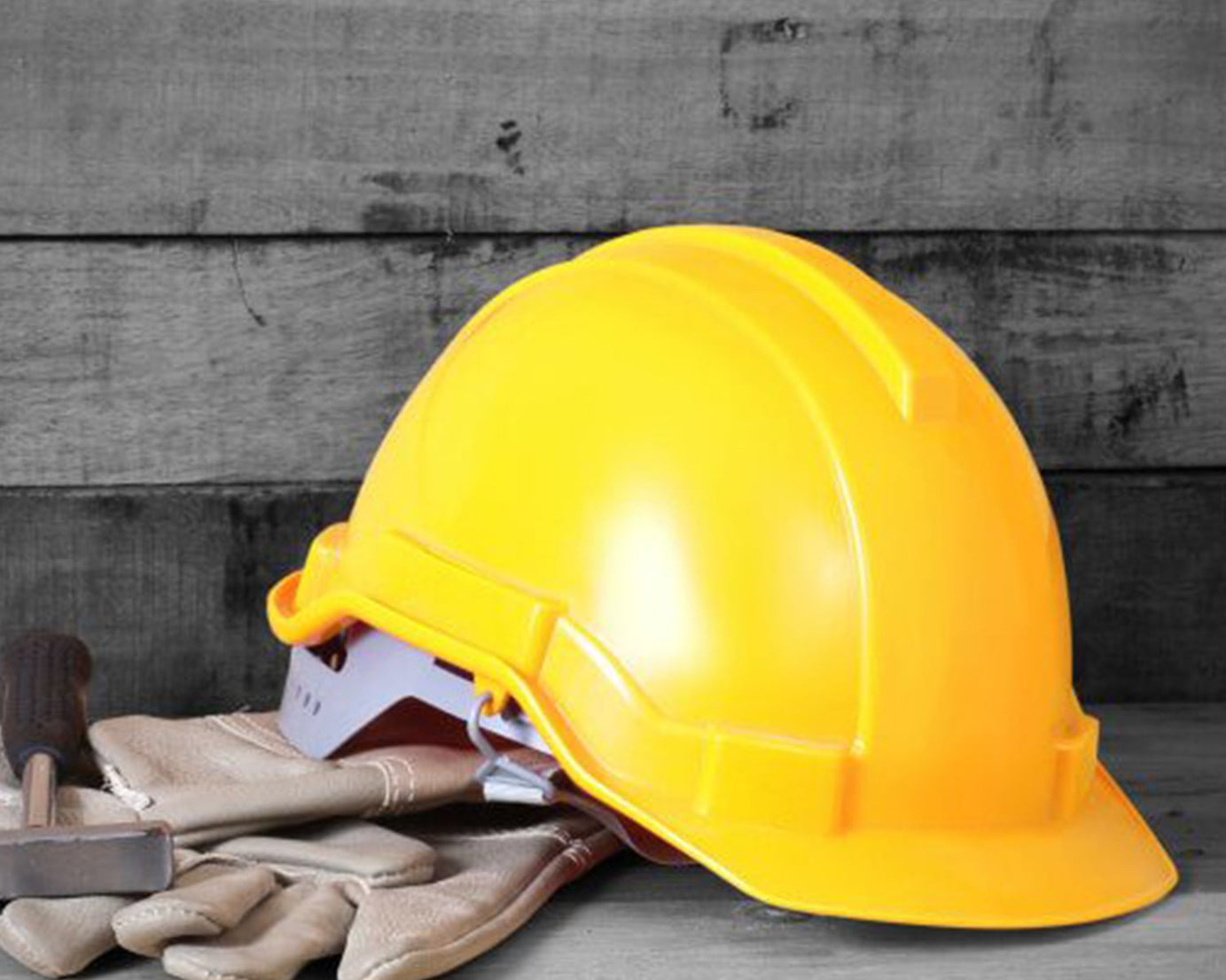 Durable yellow plastic hard hat for construction safety.