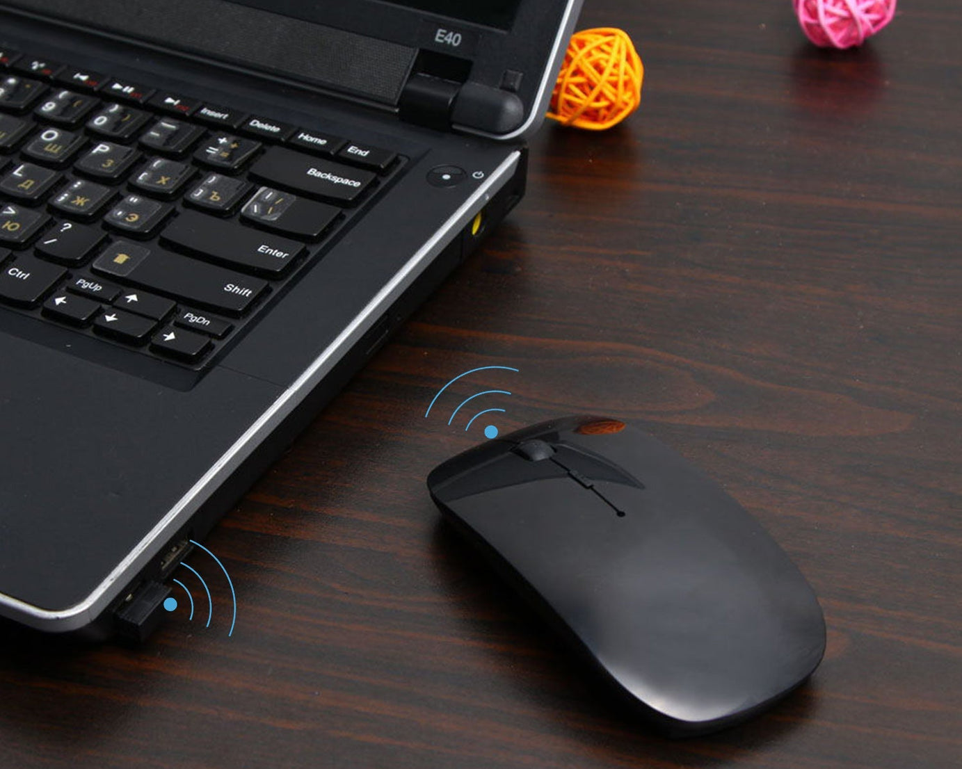 Wireless mouse for laptop, PC, Mac, and iPad, sleek design.